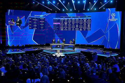 2024-25 UEFA Champions League Draw: Gianluigi Buffon, UEFA's Giorgio Marchetti and player Cristiano Ronaldo during the draw